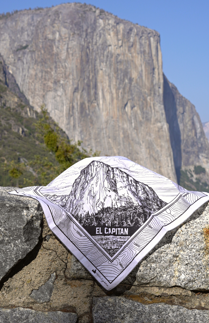 El Capitan bandana in front of El Capitan Mountain