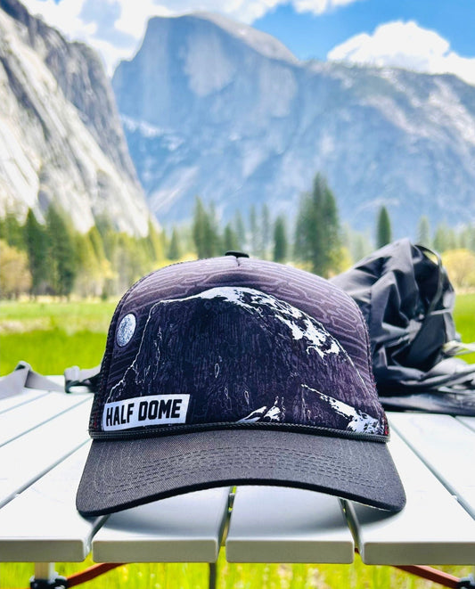 Front view of Half Dome trucker hat with Half Dome mountain in the background | HikerSight brand