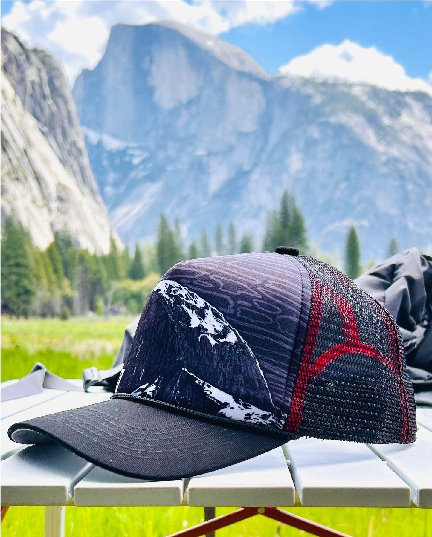 Second partial side view of Half Dome trucker hat with Half Dome mountain in the background | HikerSight brand